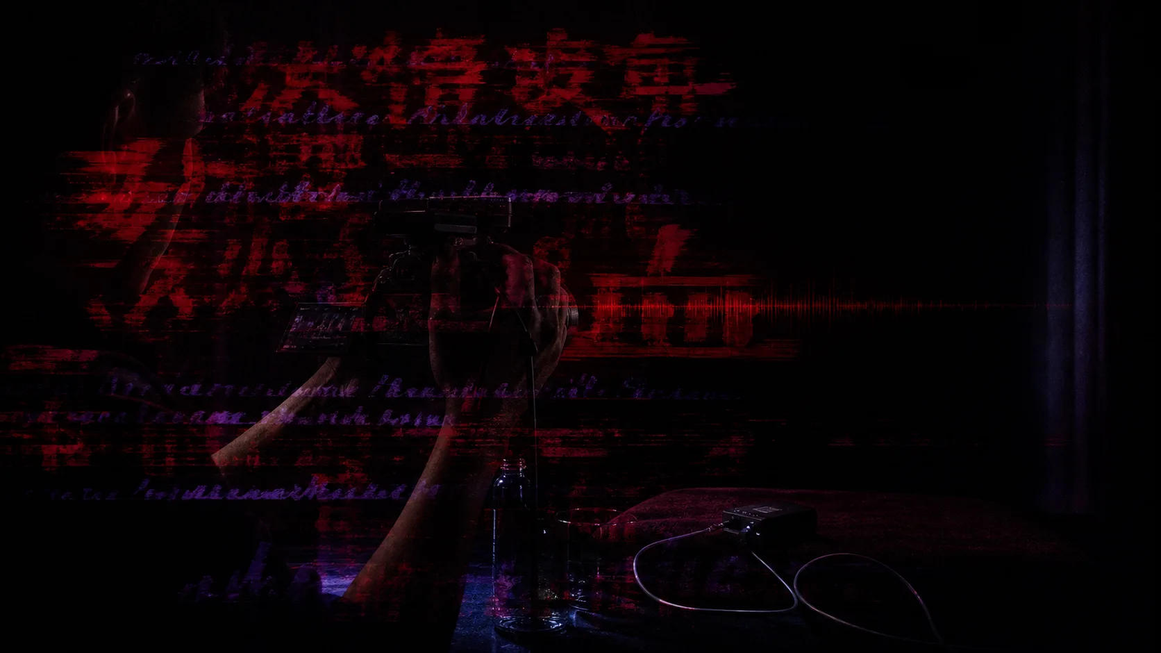 image2-12-title-presses-camera.png