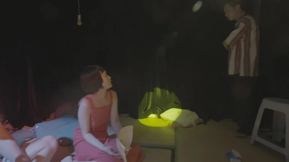 Bodies, light, and a raised position inside the live site.